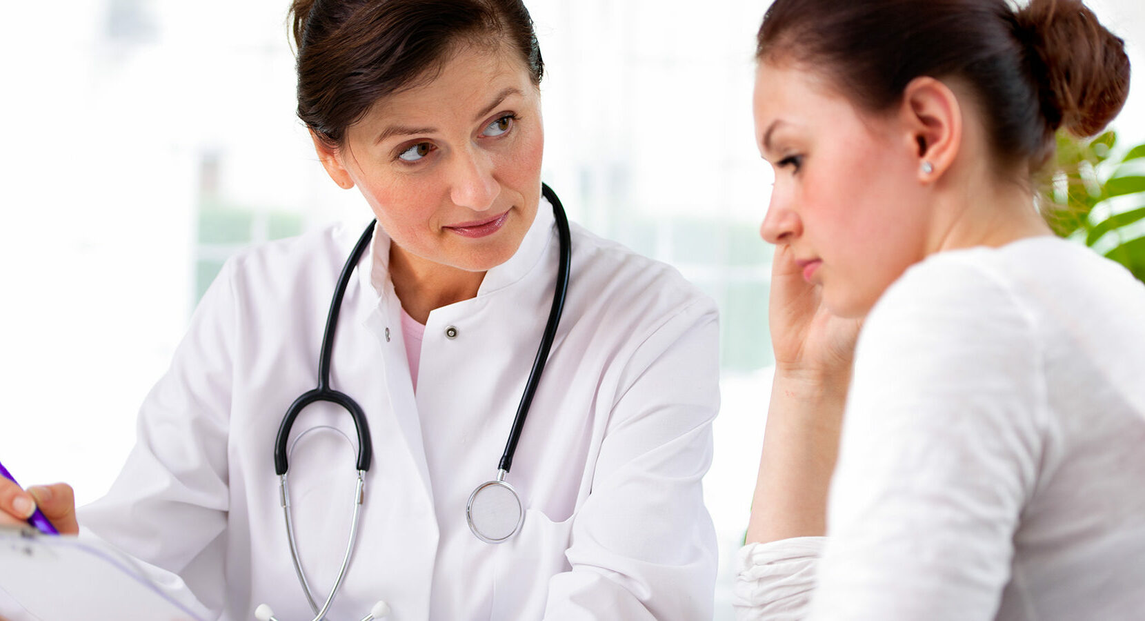 doctor with female patient